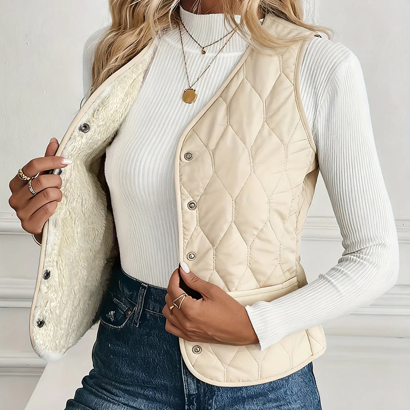 Gilet da donna trapuntato con chiusura a scatto e fodera in Sherpa